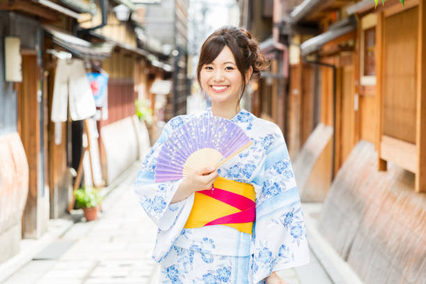 young asian woman wearing kimono in kyoto